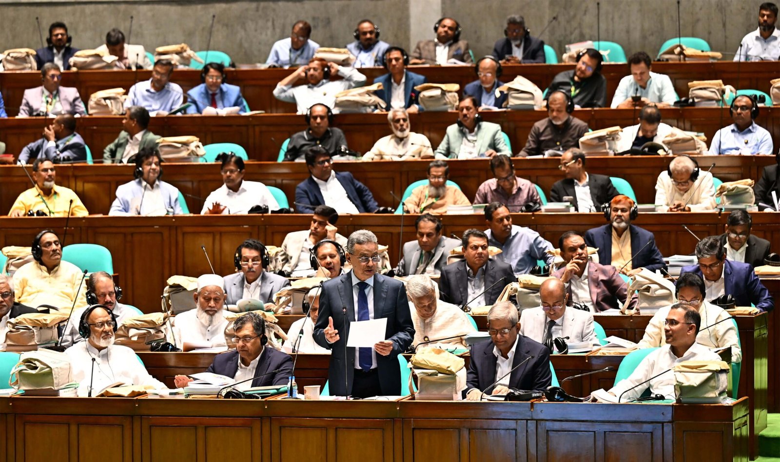 Finance Minister Amir Khasru Mahmud Chowdhury announces the budget for FY2026-27 as Prime Minister Tarique Rahman (second from left) listens. Photo: Ministry of Information